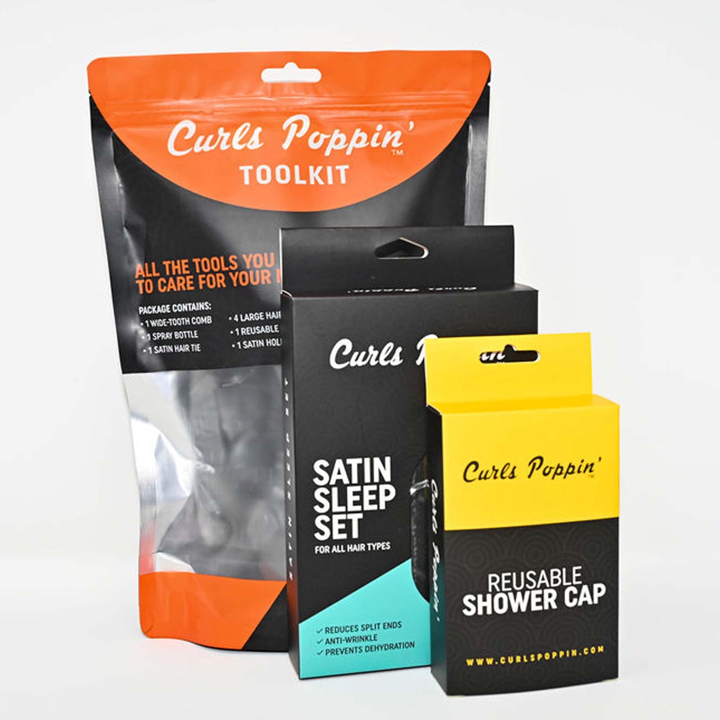 Curls Poppin Complete Curl Care Kit contains satin sleep set, reusable shower cap, etc.